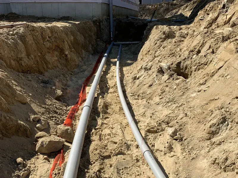 Underground 200-amp service entrance conduit run to a new construction home in Southern NH by A.J. LeBlanc Heating