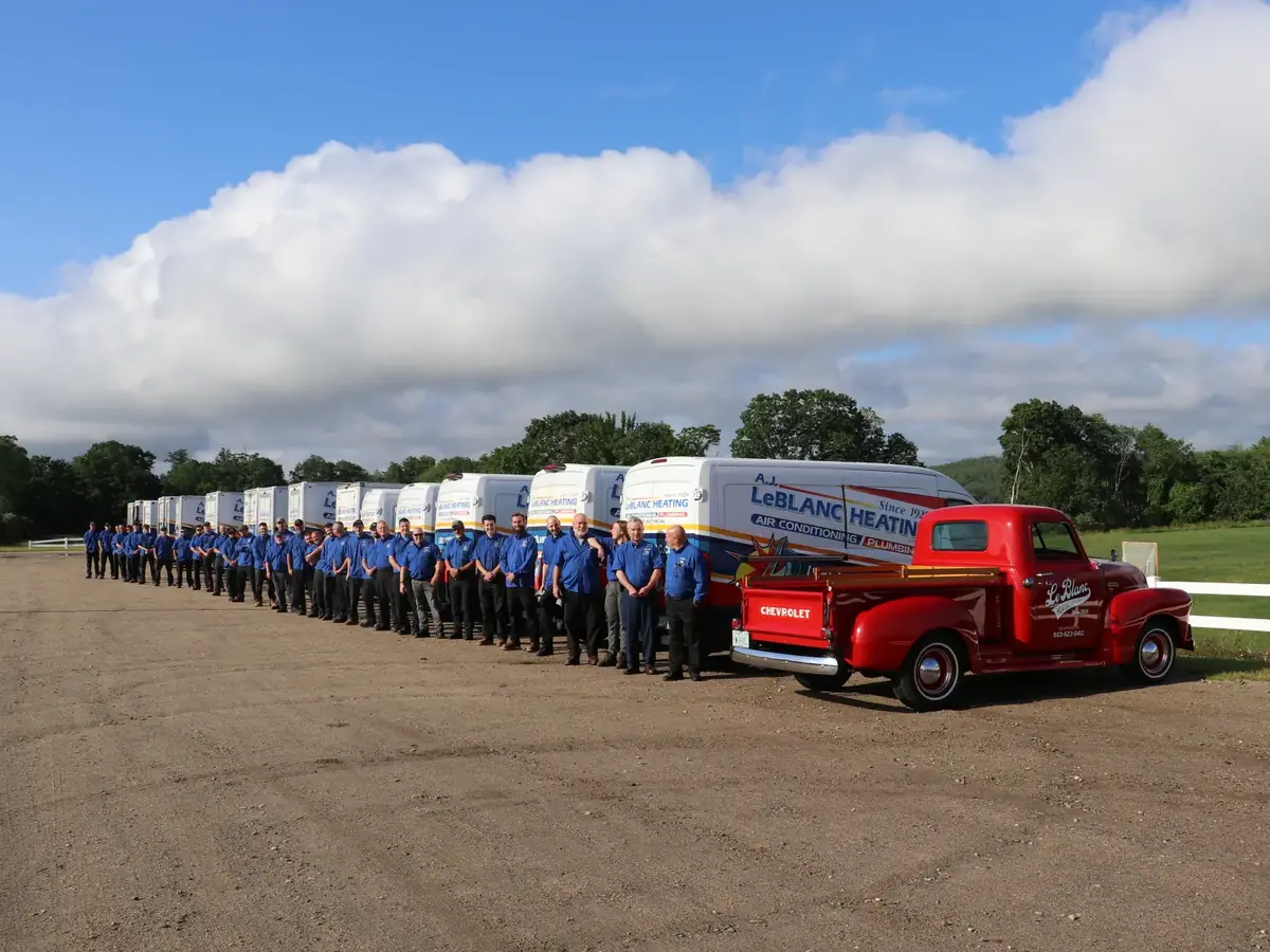 A.J. LeBlanc Heating service fleet and team serving Derry, NH
