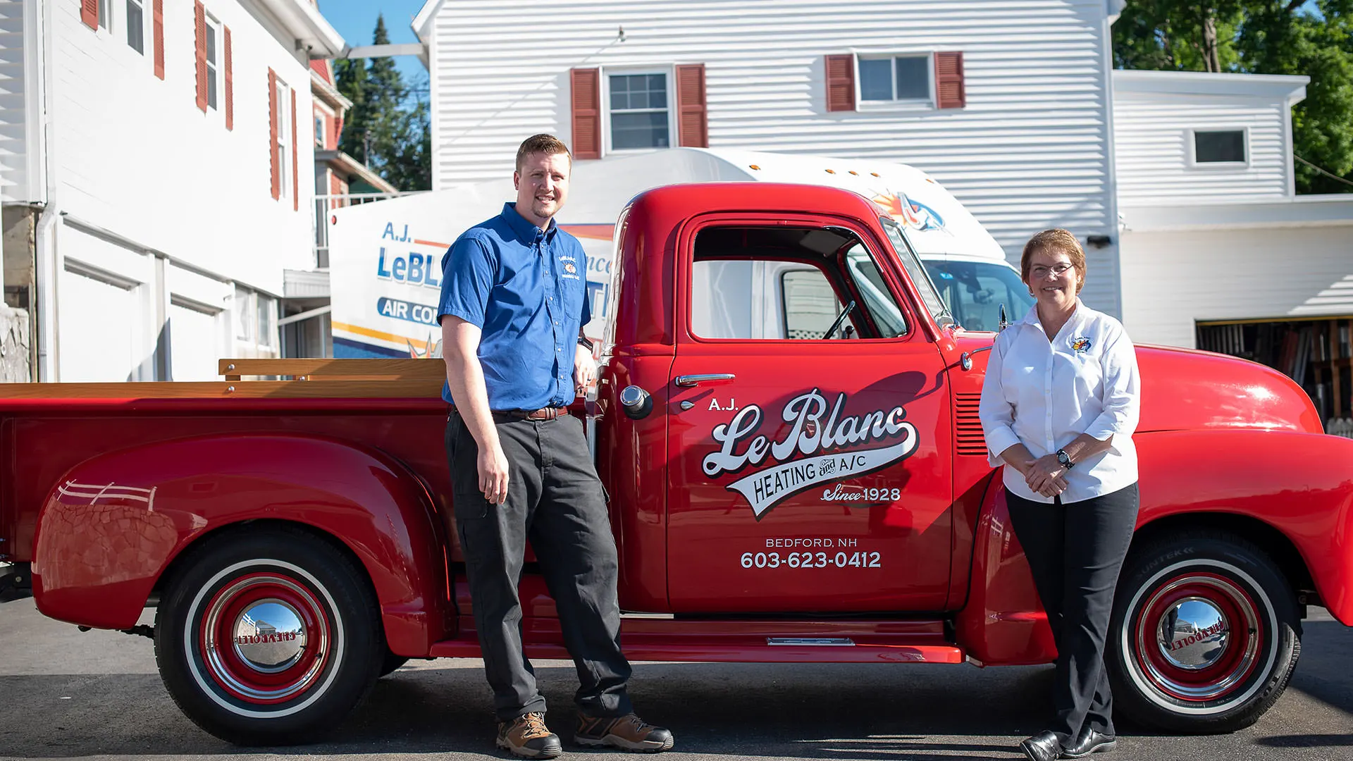 The LeBlanc family owners standing together outside A.J. LeBlanc Heating in Southern New Hampshire