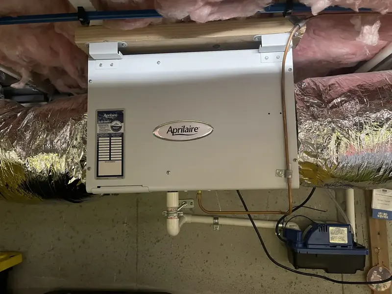 Aprilaire bypass humidifier with condensate pump installed in a Southern NH home by A.J. LeBlanc Heating