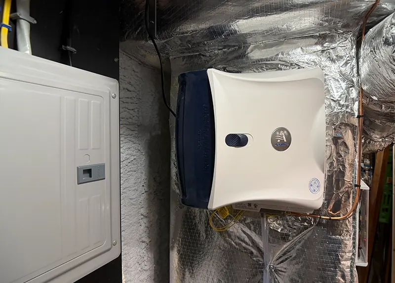 Aprilaire standalone ducted humidifier installed for a Southern NH home without central ductwork by A.J. LeBlanc Heating