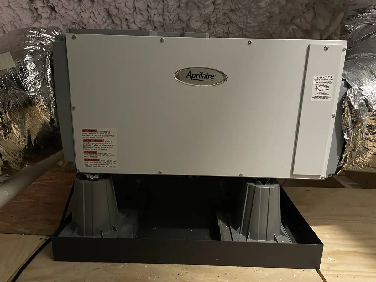 AprilAire whole-home dehumidifier installed to control indoor humidity in a New Hampshire home
