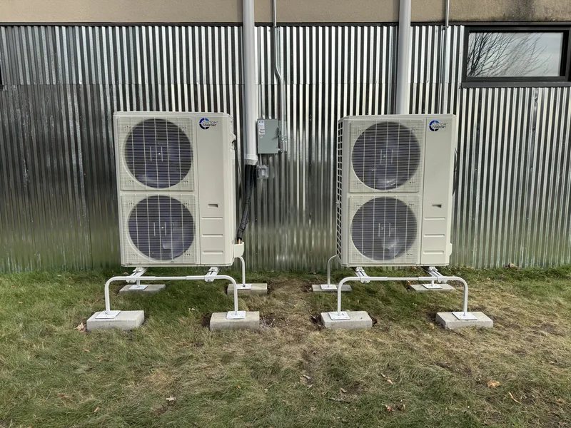 Cold-climate ducted heat pumps installed by A.J. LeBlanc Heating for a light commercial space