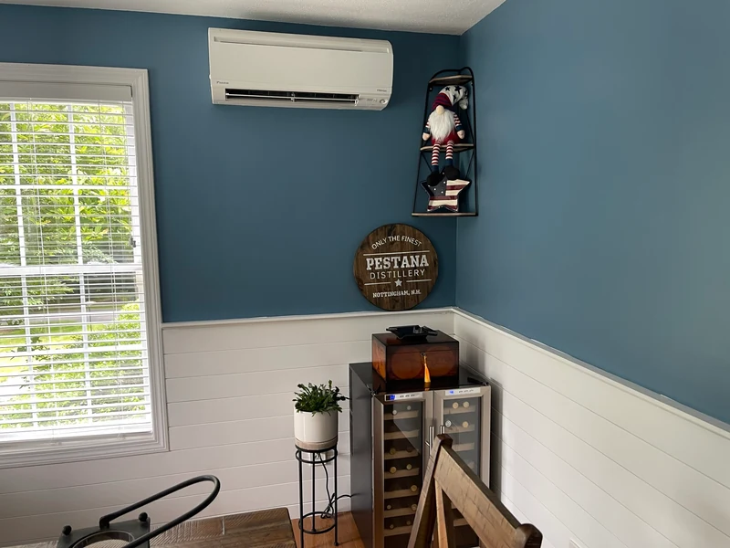 Daikin ductless mini split indoor head mounted in a Southern NH home
