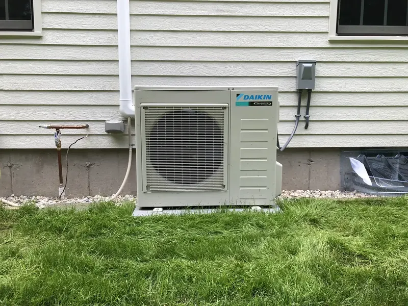 Daikin ductless mini split outdoor condenser installed by A.J. LeBlanc Heating in Southern NH