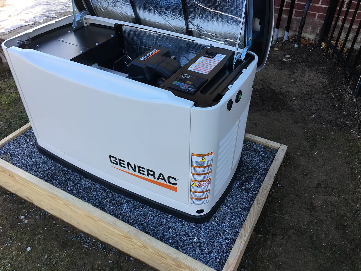Generac standby generator installation with the hood open in New Hampshire by A.J. LeBlanc Heating