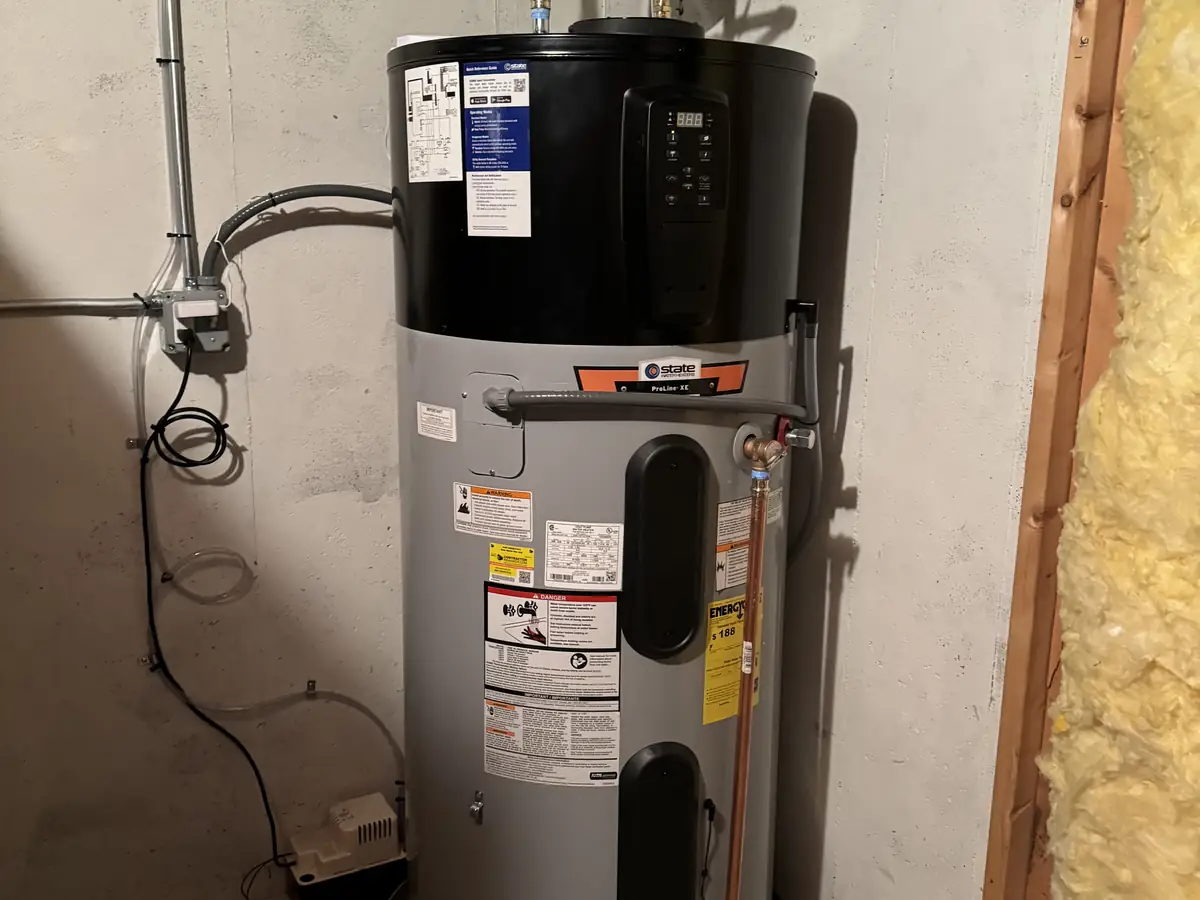 Hybrid heat pump water heater installed in a New Hampshire basement by A.J. LeBlanc Heating