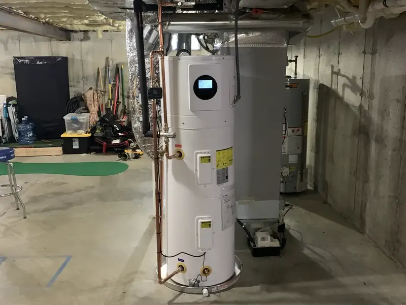 Bosch hybrid heat pump water heater installed by A.J. LeBlanc Heating in a Southern NH home