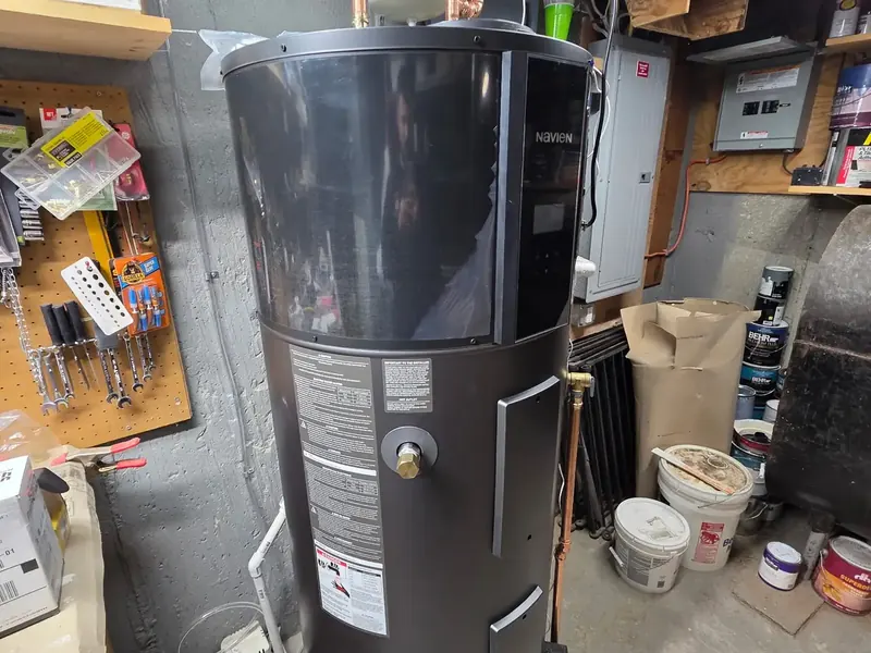 Navien hybrid heat pump water heater installed by A.J. LeBlanc Heating in a Southern NH workshop
