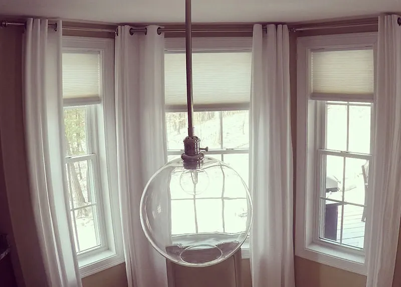 Globe pendant light installation by A.J. LeBlanc Heating's electricians