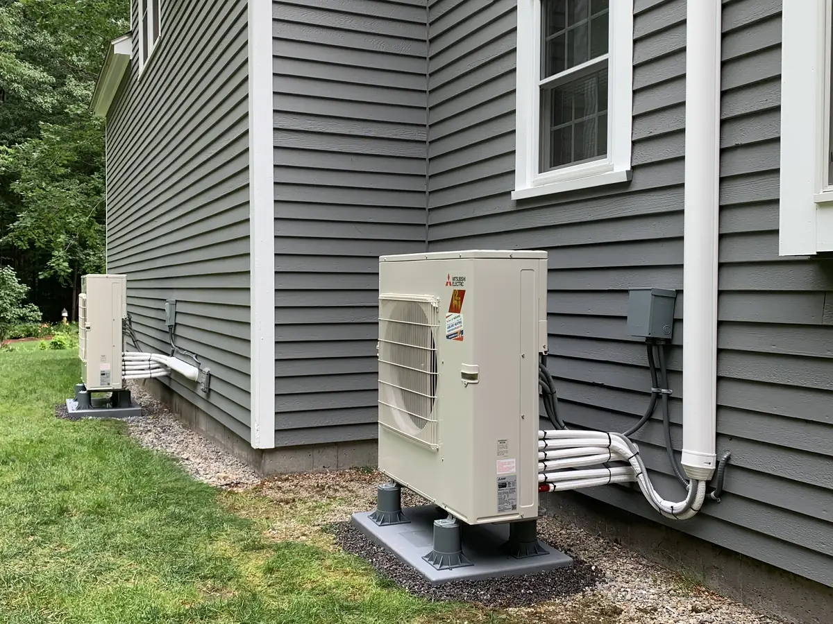 Mitsubishi multi-zone ductless mini split outdoor units installed by A.J. LeBlanc Heating at a Southern NH home