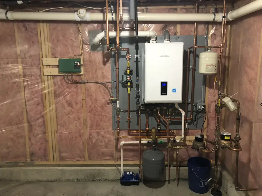 Navien wall-hung condensing boiler installed by A.J. LeBlanc Heating in a new construction Southern NH basement