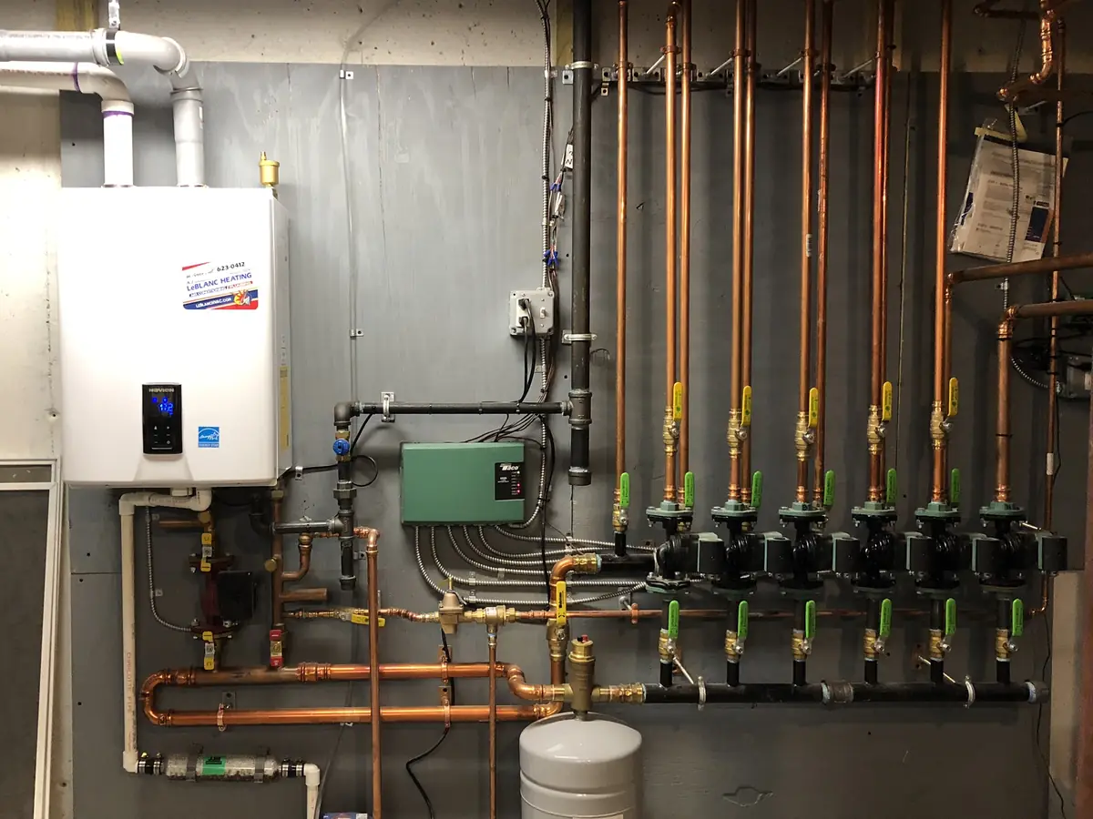 Navien condensing boiler with zoned hydronic heating installed in a New Hampshire home by A.J. LeBlanc Heating
