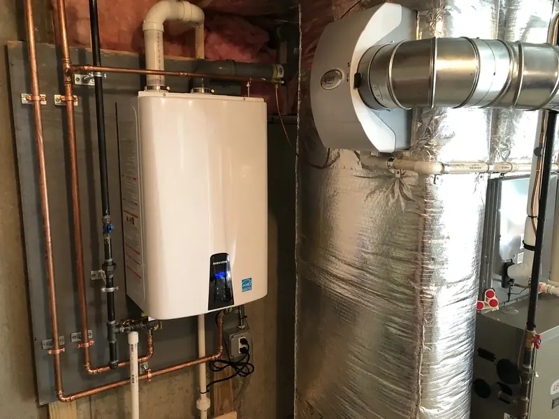 Navien condensing tankless water heater installed by A.J. LeBlanc Heating in a Southern NH home