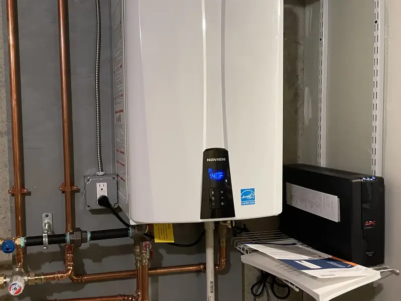 Navien on-demand water heater installed by A.J. LeBlanc Heating in a Southern NH basement
