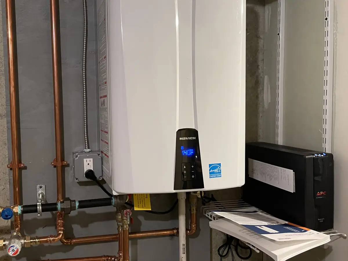 Navien tankless water heater cleanly installed in a New Hampshire home by A.J. LeBlanc Heating
