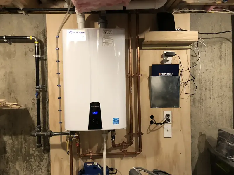 Wall-hung Navien tankless water heater installed by A.J. LeBlanc Heating in a Southern NH home