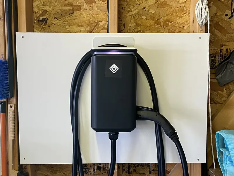 Rivian Wall Charger Level 2 EV charger installed on a garage wall in Southern NH