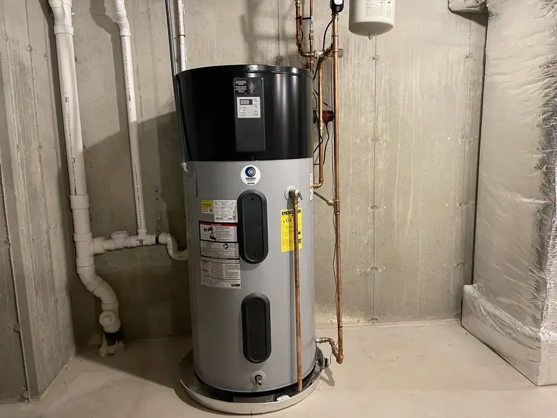 State hybrid heat pump water heater installation in a Southern NH basement by A.J. LeBlanc Heating