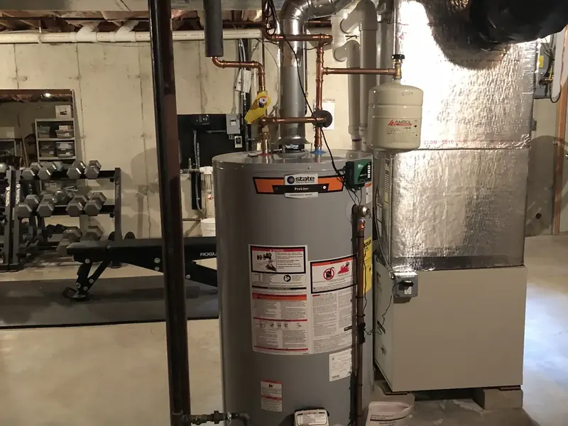 State ProLine gas tank water heater installation in a finished Southern NH basement by A.J. LeBlanc Heating