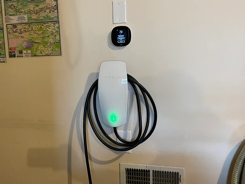 Tesla Wall Connector Gen 2 installation alongside an ecobee thermostat in a Southern NH home