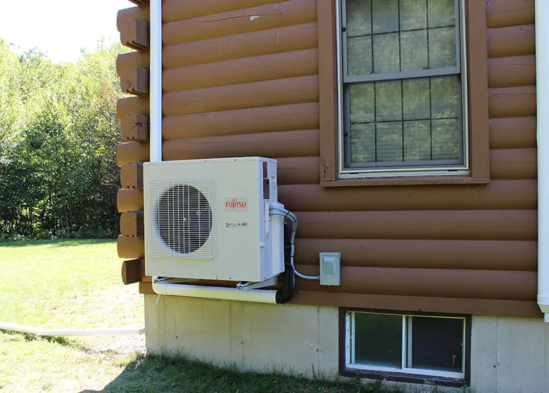 Wall hung Fujitsu ductless mini split condenser