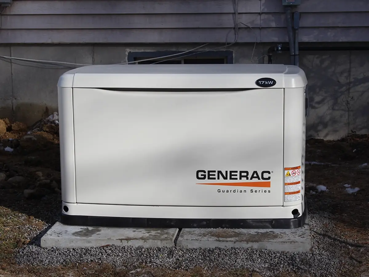 Whole-home standby generator installed next to a Southern NH home by A.J. LeBlanc Heating